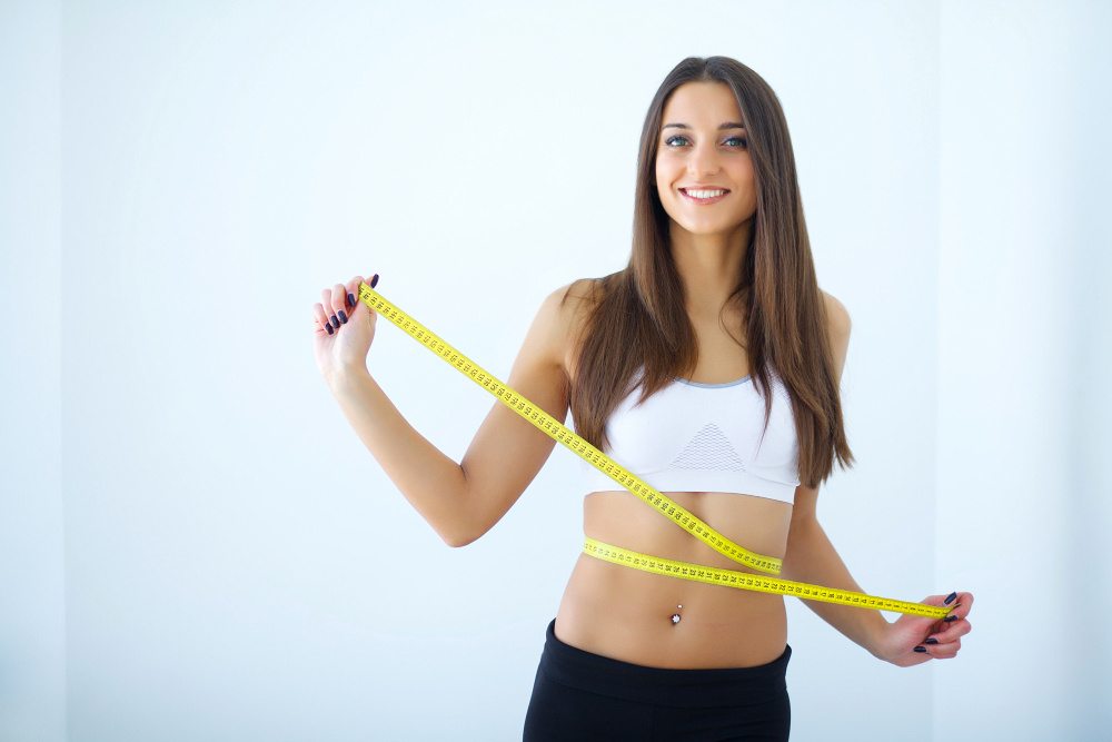 diet-girl-taking-measurements-her-body