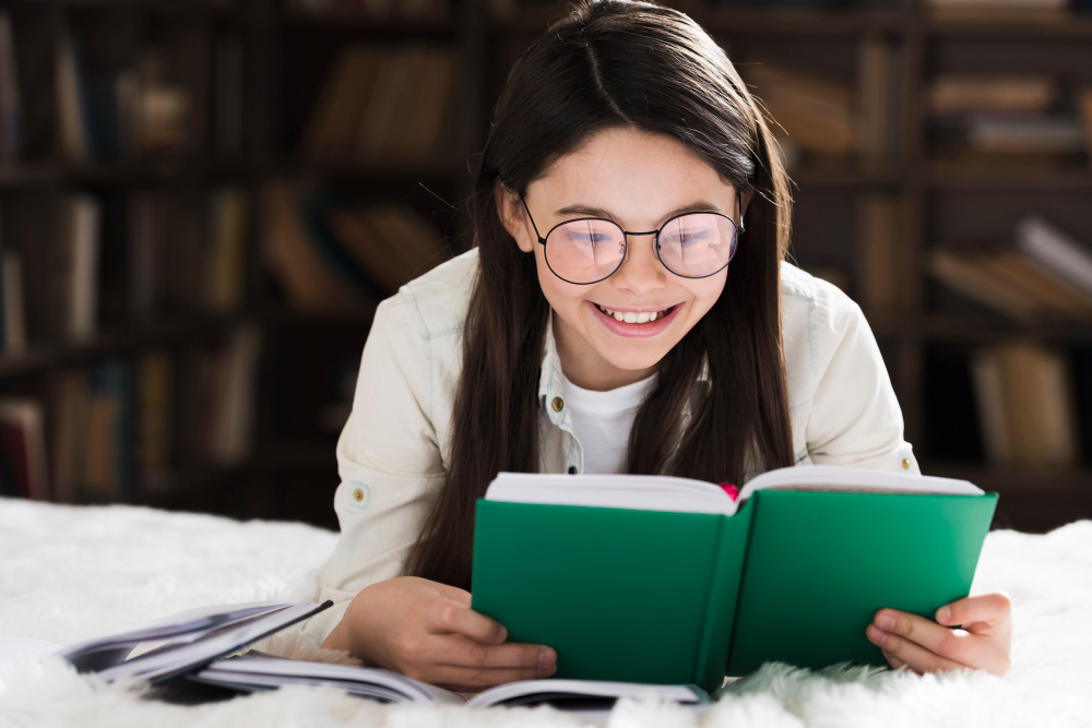 portrait-cute-little-girl-reading-book
